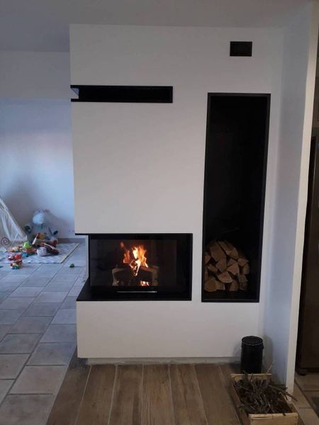 Notre zone d'activité pour ce service Revendeur de foyers à bois de marque Fondis avec installation encastrée sur-mesure pour projet de cheminée contemporaine haut de gamme