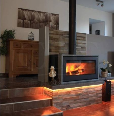Notre zone d'activité pour ce service Prix pour un insert à bois Lotus à feu continu double combustion avec installation dans une cheminée rustique déjà existante